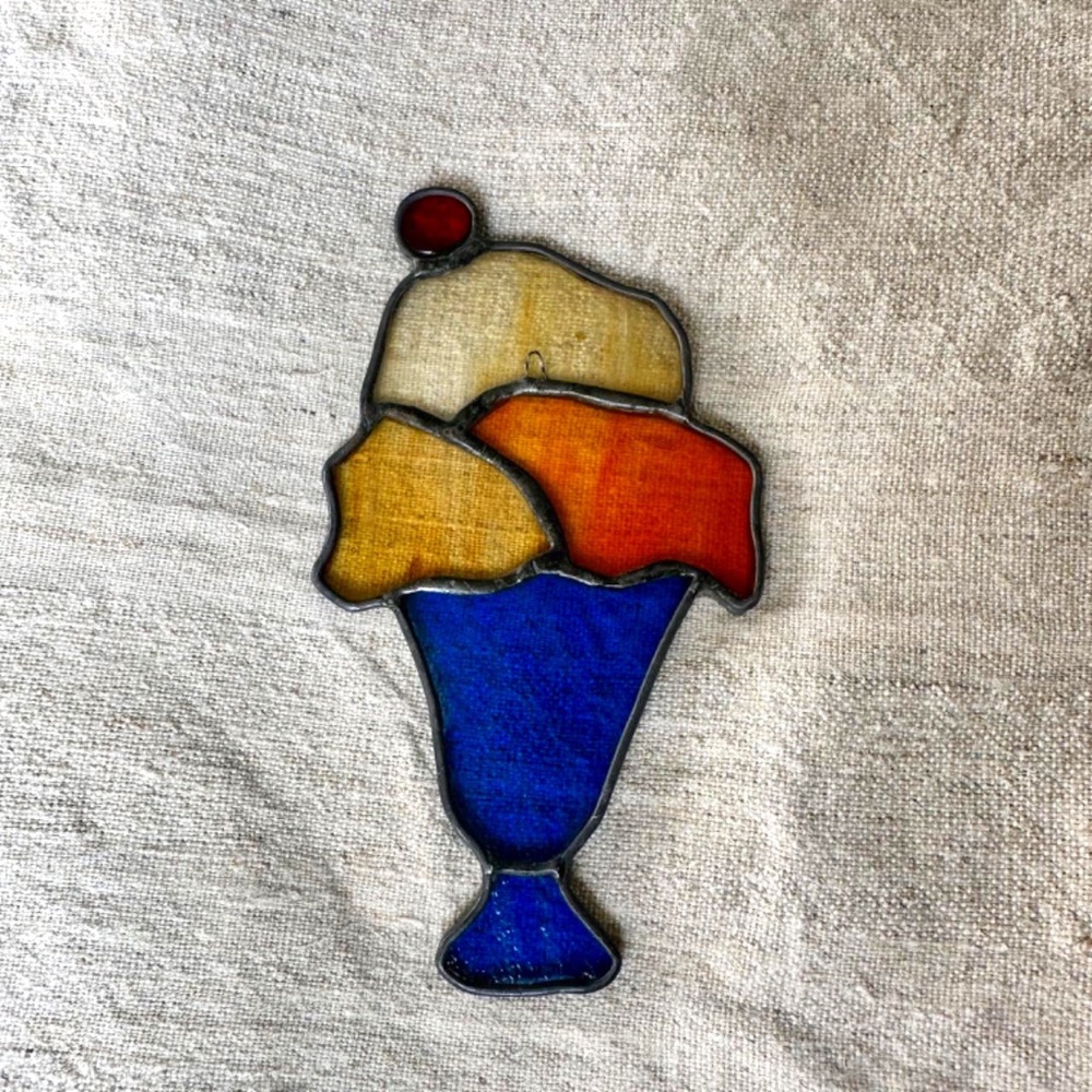 Vintage stained glass ice cream wall art.